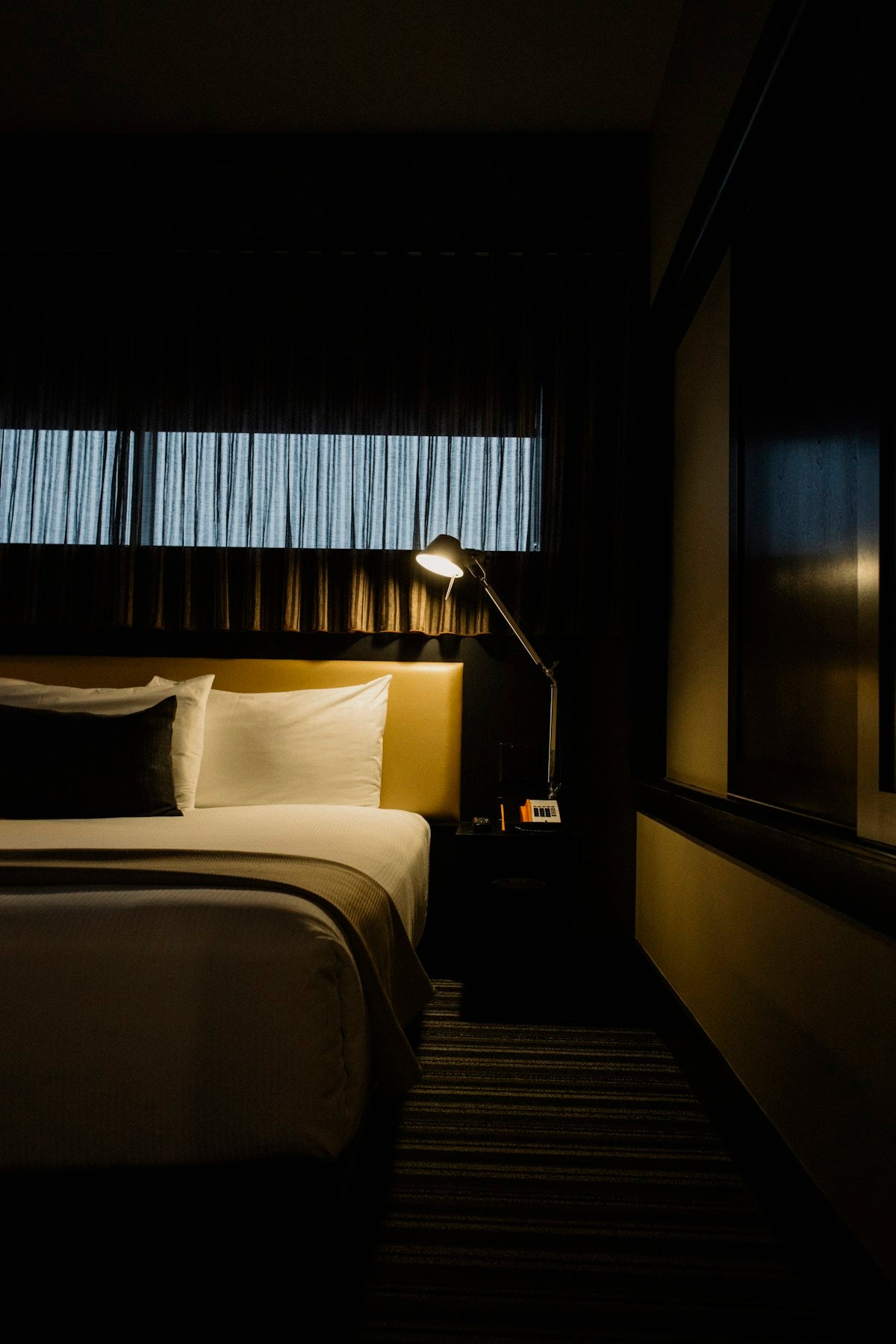 Table lamp beside a bed