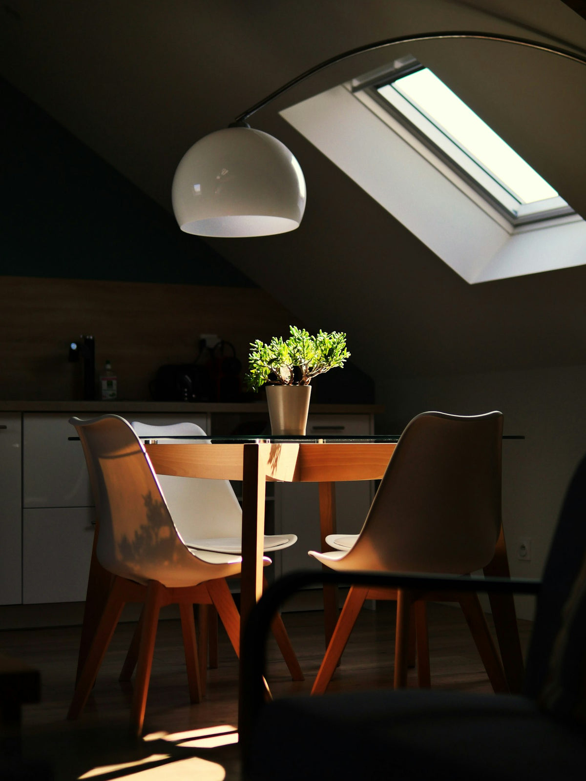 Arc lamp over a dining table