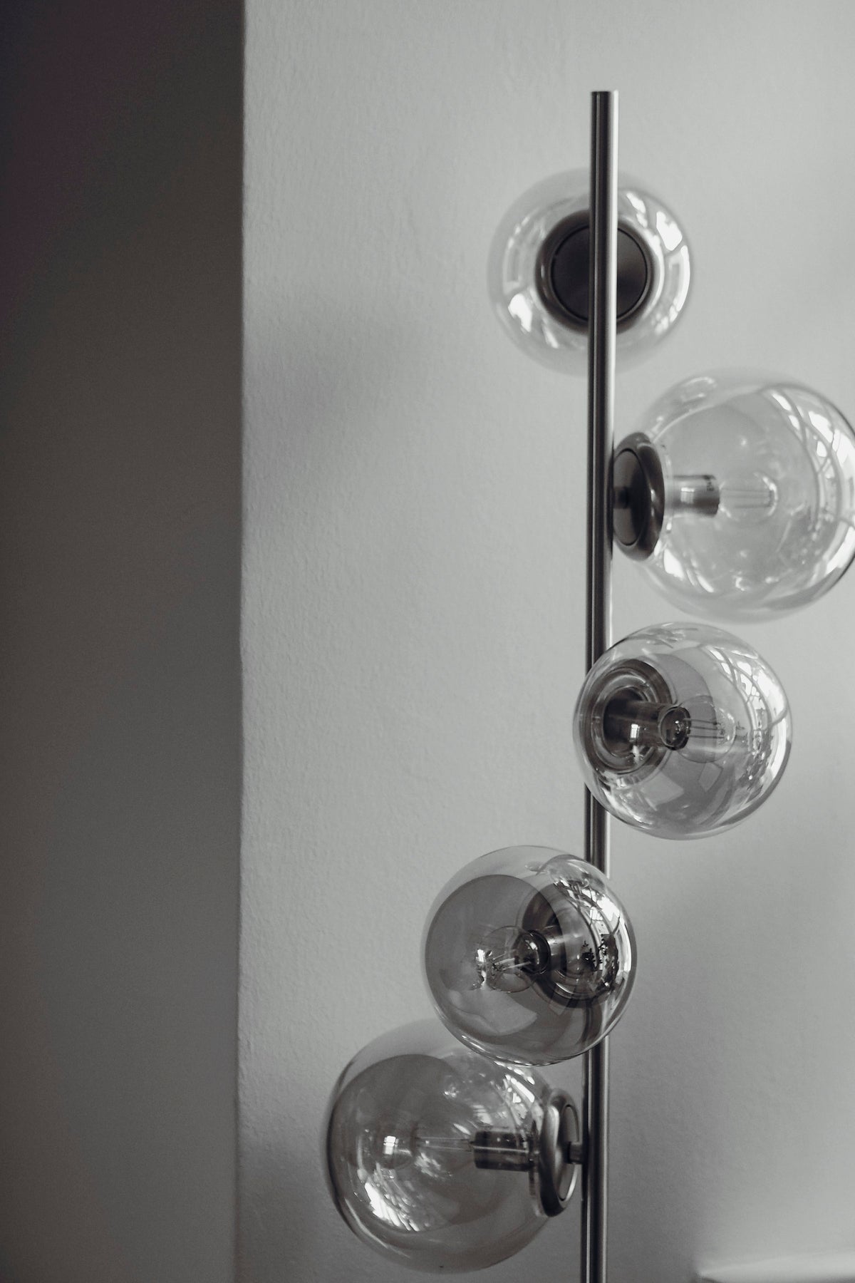Chrome floor lamp with five smoked glass globes